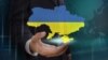 Generic – Businessman showing map of Ukraine on globe background