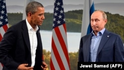 Barak Obama (solda) və Vladimir Putin, 2013-cü il